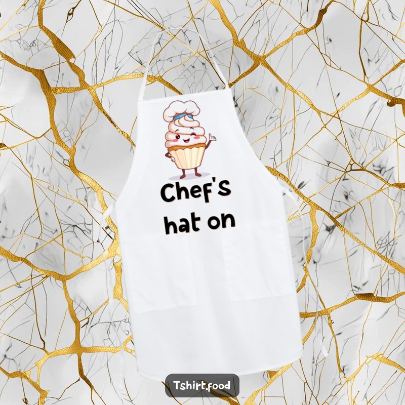 Funny Cupcake Chef Apron depicting a proud cupcake in a chef hat striking a humorous pose, designed for kitchen protection and showcasing baking pride.