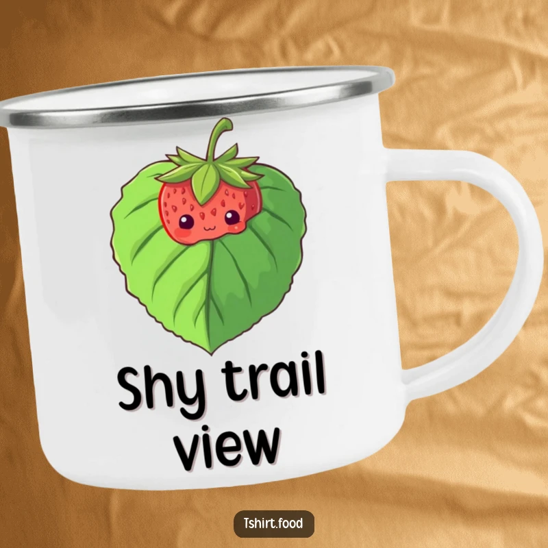 Funny camping mug depicting a shy strawberry peeking from behind a large leaf, built for gentle outdoor enjoyment.