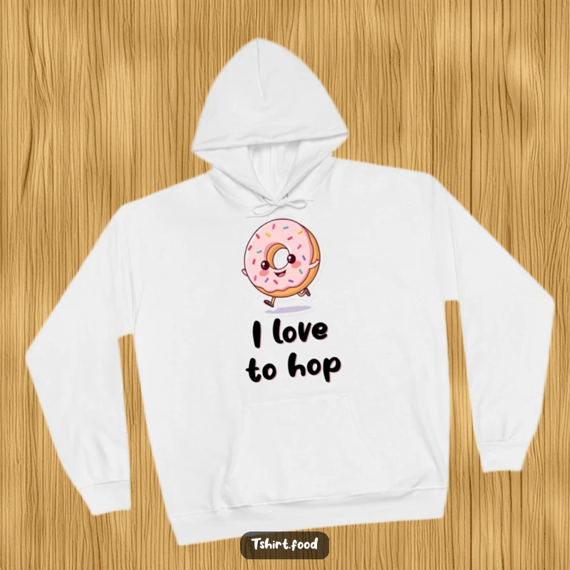 Funny hoodie featuring a happy, sprinkled donut doing a little hop, offering warmth and cheerful, sweet vibes.