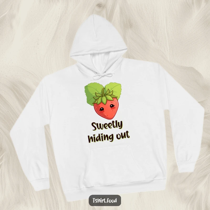 Cozy funny shy strawberry hoodie, peeking from behind a leaf, offering warmth and cute humor. Ideal funny gift.