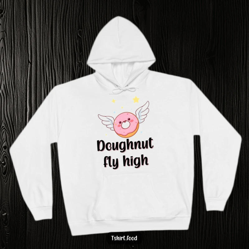 Funny hoodie featuring a joyful donut with wings soaring through a cosmic, starlit sky, representing sweet escape and delicious dreams.