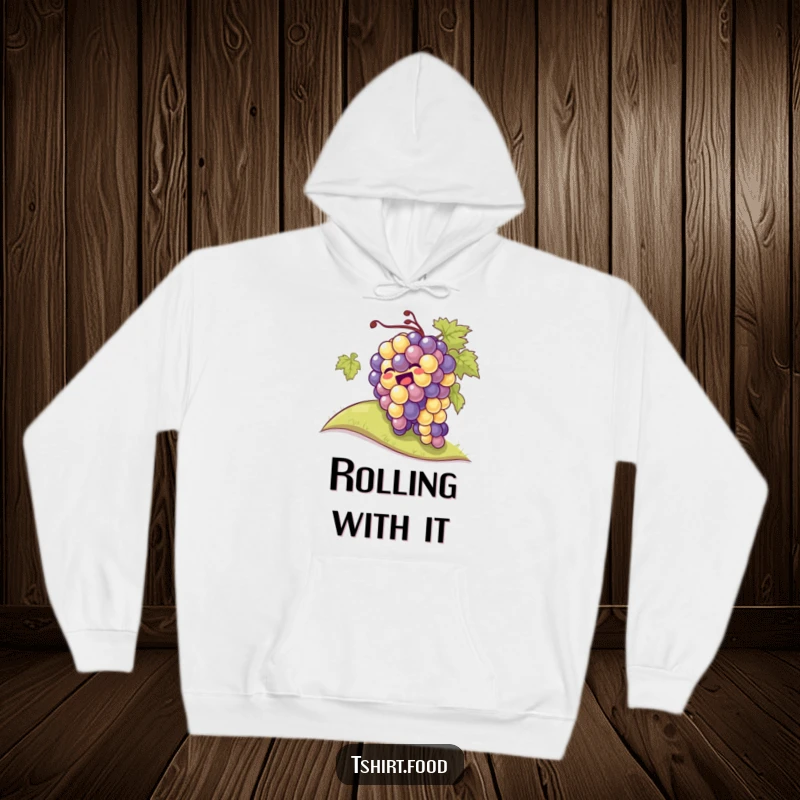 Comfortable hoodie featuring a giggling bunch of grapes rolling down a hill, perfect for cozy, fun-filled days.