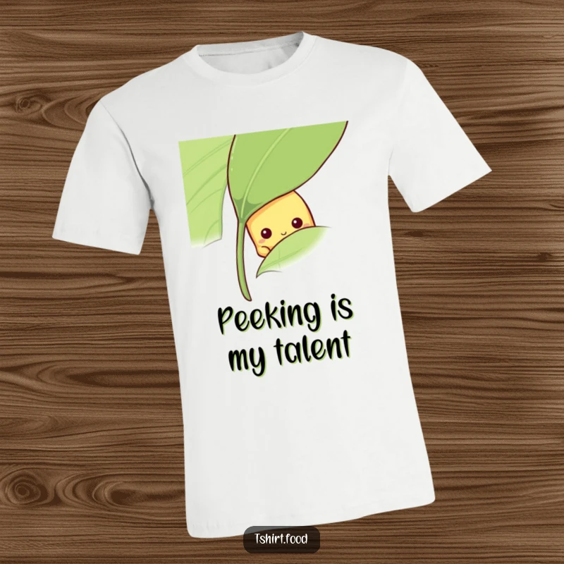 Funny shy banana t-shirt with a fruit peeking from behind a leaf, ideal funny gift.